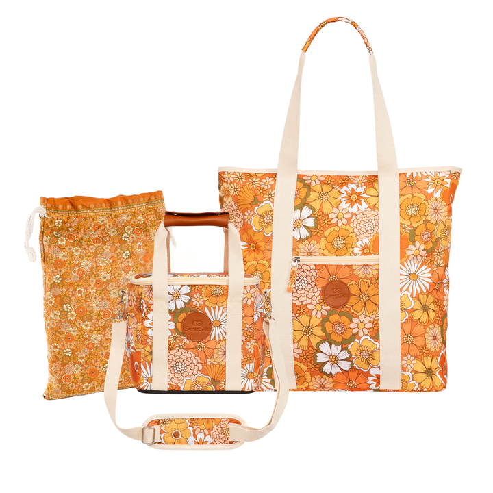 Floral-patterned tote bag with a smaller matching cooler and towel