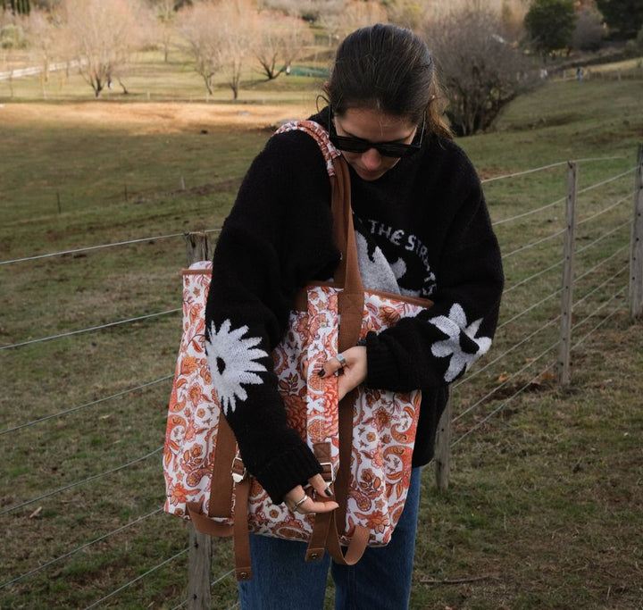 floral-patterned tote bag outdoors