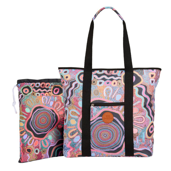 Two colorful patterned bags with black handles on a white background