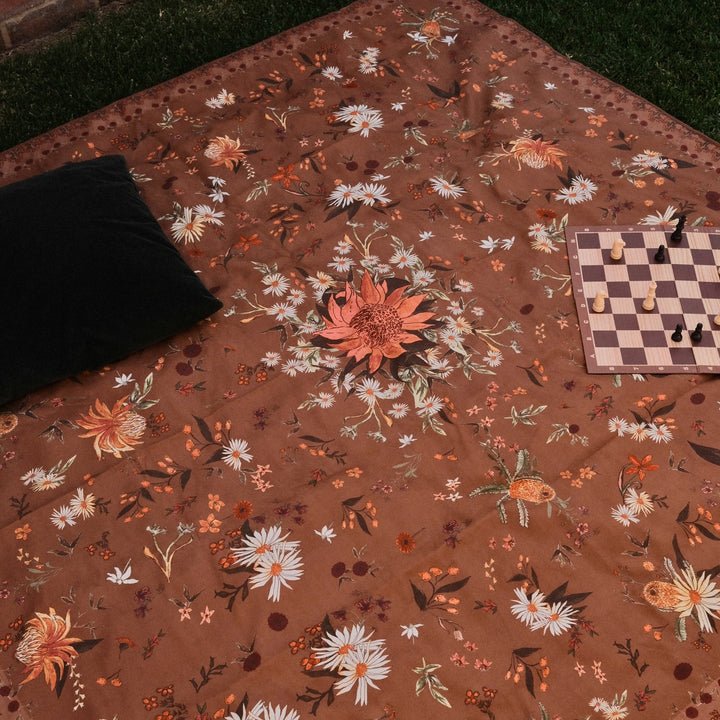 Native Australia sand free beach towel laying with chess board