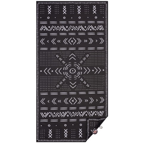 Black towel with white geometric pattern in white 