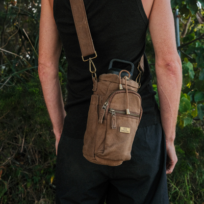 cross body bottle bag brown male model
