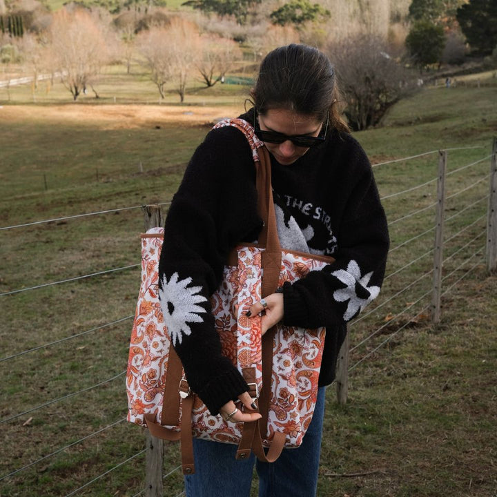  floral-patterned tote bag outdoors 