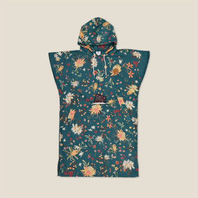 Native Botanical adult hooded towel poncho, dark green Australian wildflower print, studio flat lay