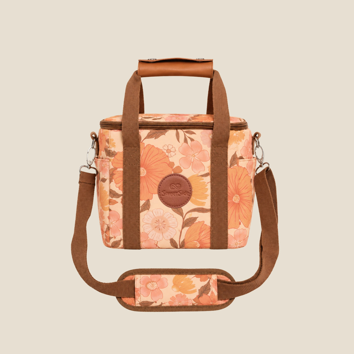 Summer Muse mini insulated cooler bag, peach retro 70s floral print, studio front view with shoulder strap