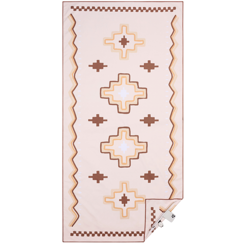 Beige towel with decorative patterns on a white background