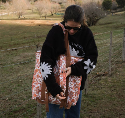  floral-patterned tote bag outdoors 